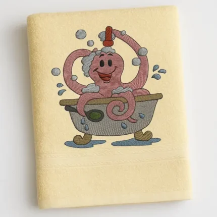Yellow towel with happy pink octopus in a bathtub spraying bubbles