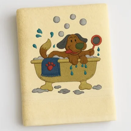 Cream cotton towel with cartoon dog taking a bubbly bath embroidered design