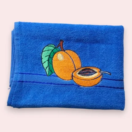 Blue cotton towel with embroidered apricot fruit and leaf design