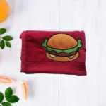 Maroon cotton towel with embroidered burger design