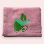 Pink cotton towel with green tea cup and leaf embroidery design